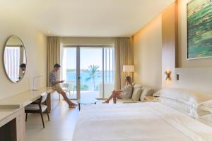 Postel nebo postele na pokoji v ubytování Barceló Maya Riviera - All Inclusive Adults Only