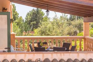 A balcony or terrace at Villa Pula Viñas Country villa 3 bedrooms pool and fabulous views of the Pula golf course near Son servera