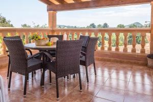 A balcony or terrace at Villa Pula Viñas Country villa 3 bedrooms pool and fabulous views of the Pula golf course near Son servera