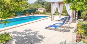 The swimming pool at or close to Villa Pula Viñas Country villa 3 bedrooms pool and fabulous views of the Pula golf course near Son servera