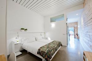 A bed or beds in a room at Centro de Ecoturismo Tierra del Agua