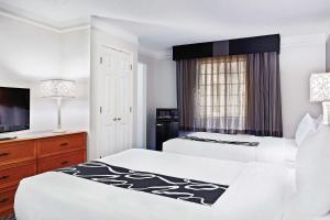 Postel nebo postele na pokoji v ubytování La Quinta Inn by Wyndham Champaign