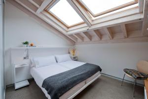 A bed or beds in a room at Centro de Ecoturismo Tierra del Agua