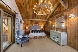 เตียงในห้องที่ Chalet Le Lodge