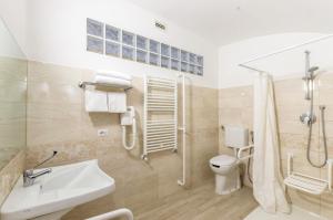 Koupelna v ubytování Hotel Tempio Di Pallade