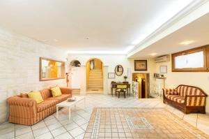 Posezení v ubytování Hotel Tempio Di Pallade