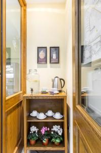 Kuchyň nebo kuchyňský kout v ubytování Hotel Tempio Di Pallade
