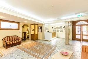 Posezení v ubytování Hotel Tempio Di Pallade