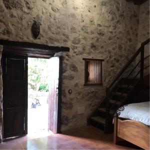 a room with a door and a staircase in a house at Casa Princess Arminda in Betancuría