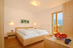 Postel nebo postele na pokoji v ubytování Pension Auerhof + 13 fotografií