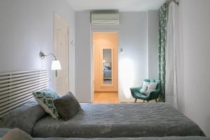 Posteľ alebo postele v izbe v ubytovaní Blanc Guest House