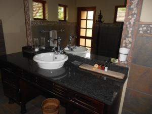 Een badkamer bij Izapa Bush And Game Lodge
