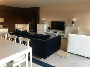 Predel za sedenje v nastanitvi Salgados Beach Apartment 6A