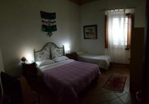 Katil atau katil-katil dalam bilik di Casa di Alfredo Affittacamere