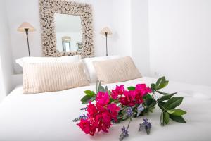 Кровать или кровати в номере Onar Villas - Onar Hotels Collection