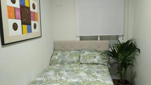 Postel nebo postele na pokoji v ubytování Apartamento el Torreón