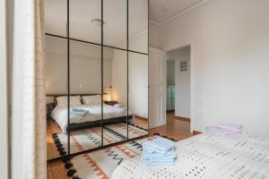 Ένα ή περισσότερα κρεβάτια σε δωμάτιο στο Comfortable spacious apartment at central position / FIL27