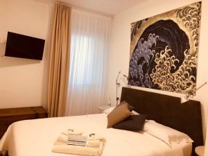 Кровать или кровати в номере B&B Mare di Fuori
