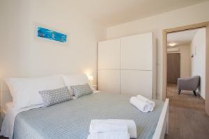 Postel nebo postele na pokoji v ubytování Apartment D