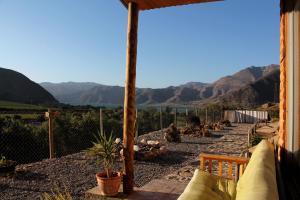 a patio with a view of the mountains at Casa Ollagua in Vicuña