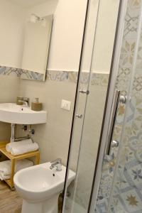 A bathroom at Modarno Exclusive Apartments