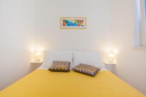 Postel nebo postele na pokoji v ubytování Apartment D