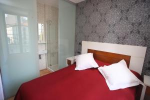 Postel nebo postele na pokoji v ubytování Hostal Centro