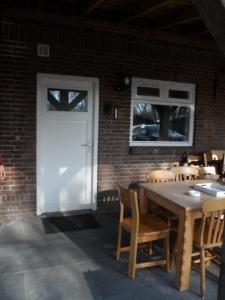 Restoran atau tempat makan lain di Hoeveheikant Vakantiewoningen