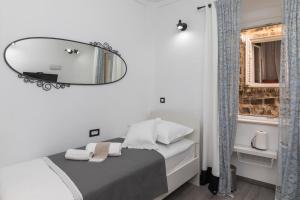Ein Bett oder Betten in einem Zimmer der Unterkunft Guest House Tomasi One
