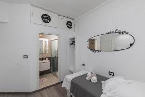 Ein Bett oder Betten in einem Zimmer der Unterkunft Guest House Tomasi One