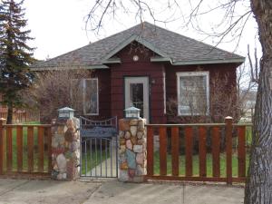 a small house with a fence and a gate at The Homestead in Chester