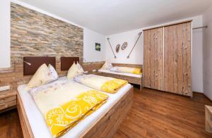 Postel nebo postele na pokoji v ubytování Appartement Pension Albert summercard and free parking included