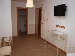 TV a/nebo společenská místnost v ubytování Hostal La Ribera del Júcar