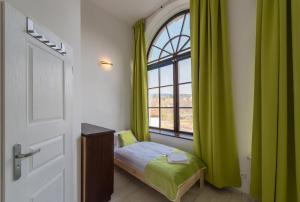 Postel nebo postele na pokoji v ubytování Penzion Zámecká Zahrada