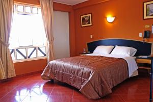 Cama ou camas em um quarto em Hotel Bohemia
