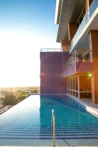 a swimming pool on the side of a building at Elegance at 20 South in Kingston