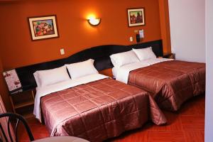 Cama ou camas em um quarto em Hotel Bohemia