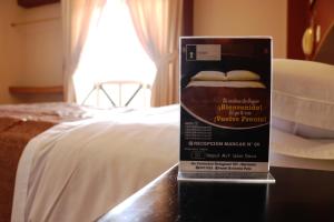 Cama ou camas em um quarto em Hotel Bohemia