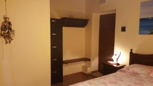 Postel nebo postele na pokoji v ubytování B&B A Robba de Pupi