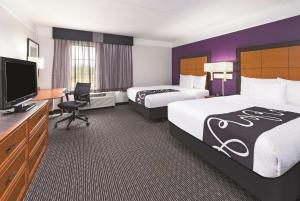 Кровать или кровати в номере La Quinta by Wyndham Phoenix Mesa West