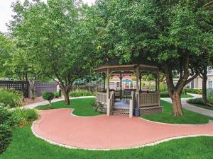 a park with a gazebo in the grass at La Quinta by Wyndham Denver Airport DIA in Denver