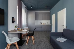 a living room with a couch and a table at WELCOME summer in Zatoka