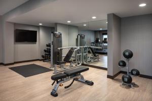 a gym with cardio equipment and a mirror at Hyatt Place San Francisco/Downtown in San Francisco