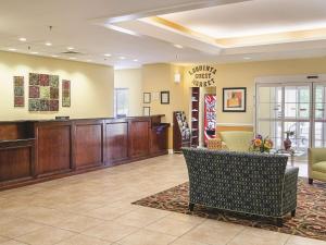 a lobby of a hospital with a waiting room at La Quinta by Wyndham Mobile Satsuma / Saraland in Satsuma