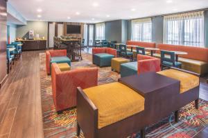 A restaurant or other place to eat at La Quinta by Wyndham O'Fallon, IL - St. Louis