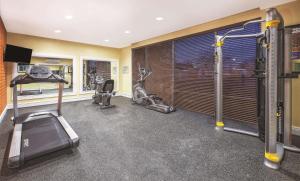 a gym with two treadmills and two exercise bikes at La Quinta by Wyndham Niagara Falls in Niagara Falls