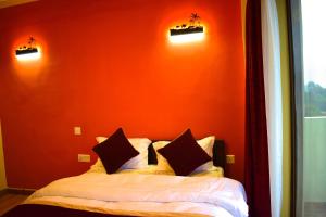 Postel nebo postele na pokoji v ubytování Hotel Nagarkot Inn
