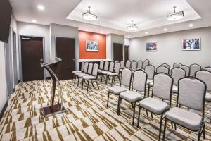 a row of chairs in a waiting room at La Quinta by Wyndham San Antonio by Frost Bank Center in San Antonio +20 photos