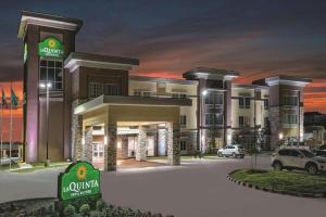 a rendering of a luxury hotel at night at La Quinta by Wyndham San Antonio by Frost Bank Center in San Antonio