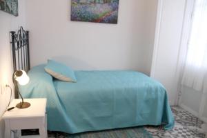 Ένα ή περισσότερα κρεβάτια σε δωμάτιο στο Casa Atahona - Casita con Encanto